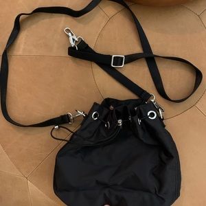 Black satchel purse from Aritzia